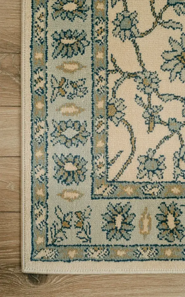 Vintage Cottage Rug Close-Up: Floral Pattern & Weave on Light Wood Floor